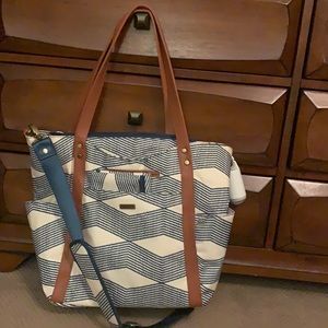 Used one time, diaper bag with changing pad.